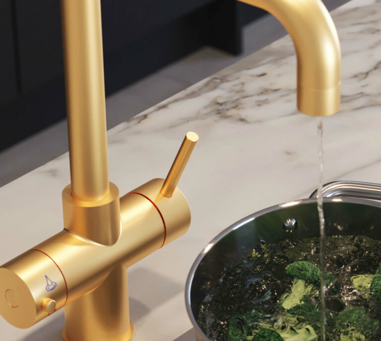 3 in 1 gold D-shape water tap running water in a pan with broccoli