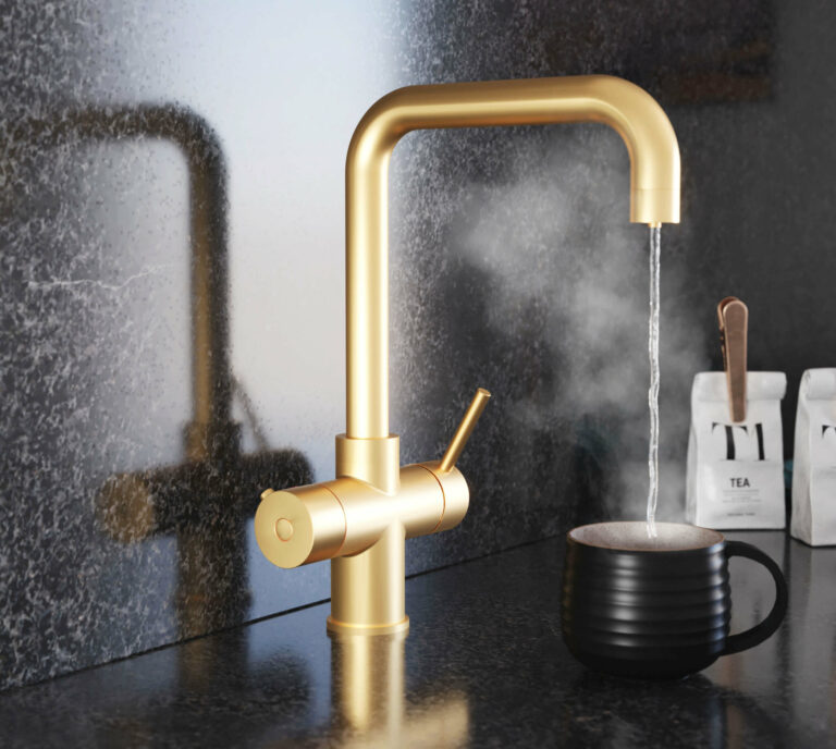 a D-shape gold hot water tap with boiling water running from spout into a matt black mug