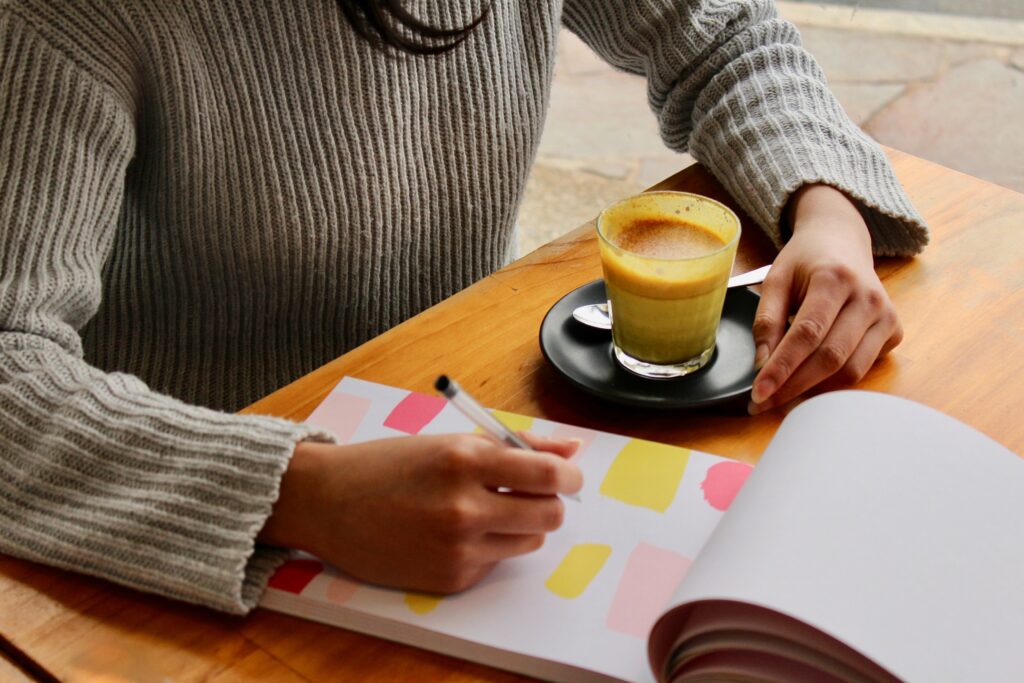 planning a kitchen colour scheme with a cup of coffee