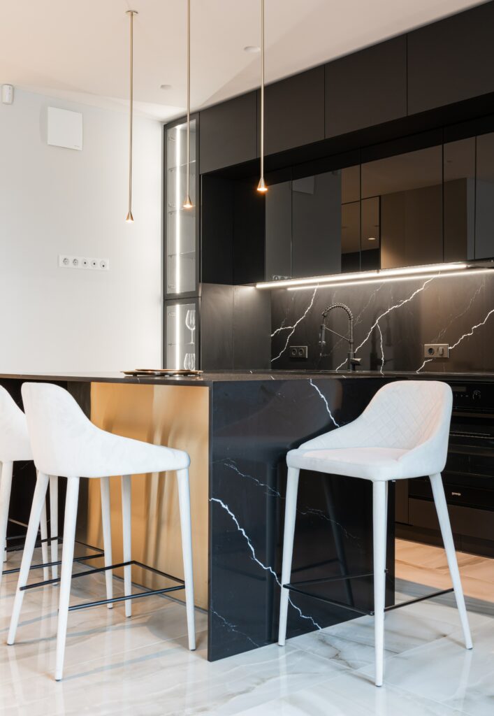 kitchen with black marble island counter