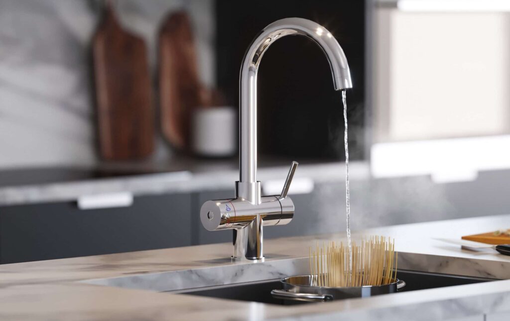 chrome boiling water tap dispensing steaming water over spaghetti