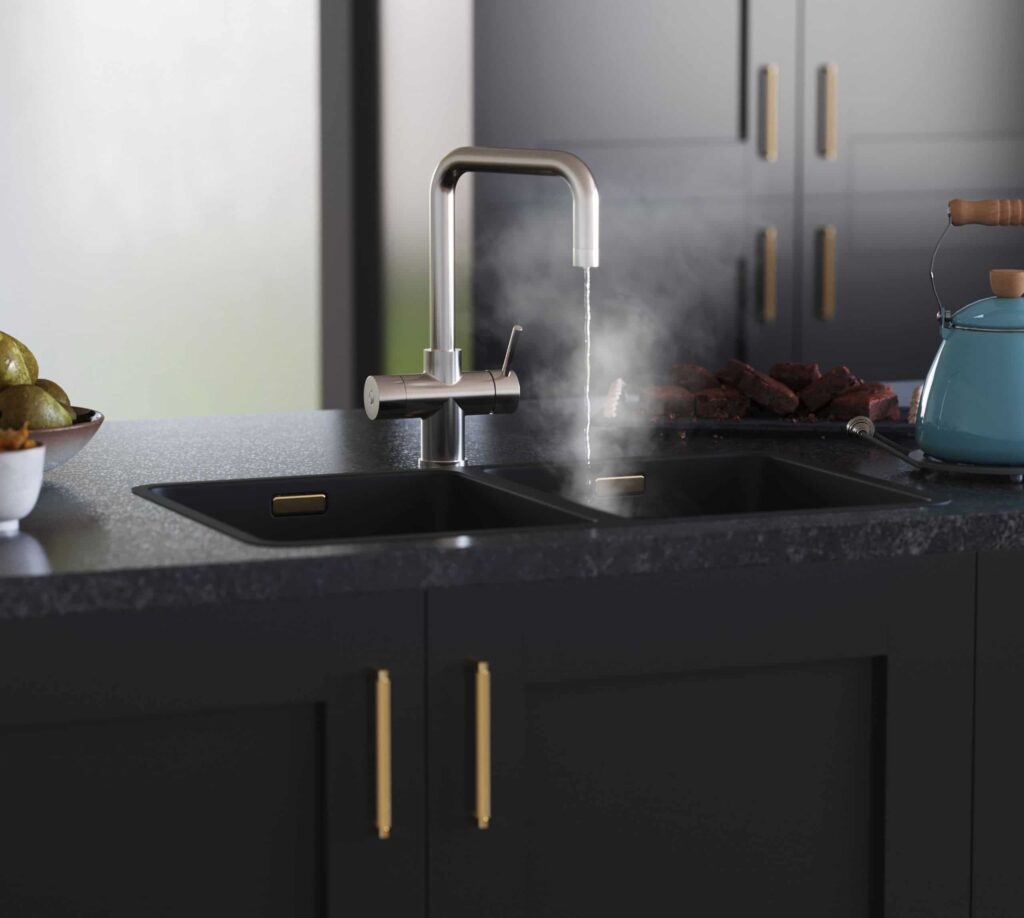 a black kitchen counter with a chrome D-shape tap with boiling water running from spout into a sink