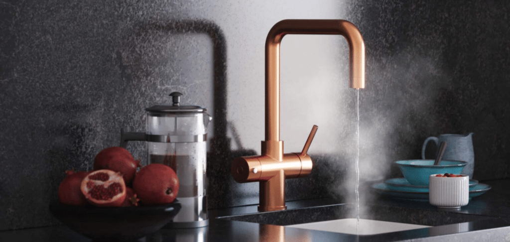 copper kitchen tap dispensing boiling water