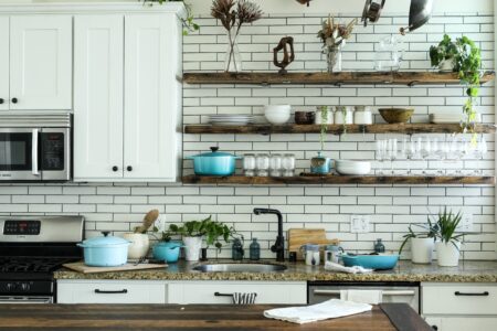 brown wooden shelves in a white kitchen