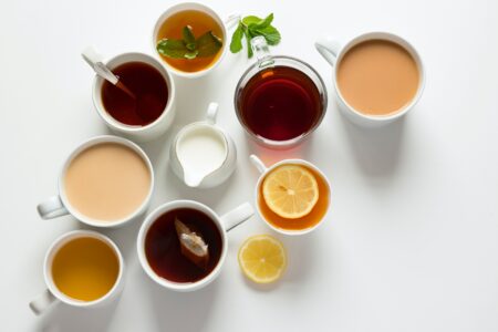 a variety of tea in cups in a flat-lay photo