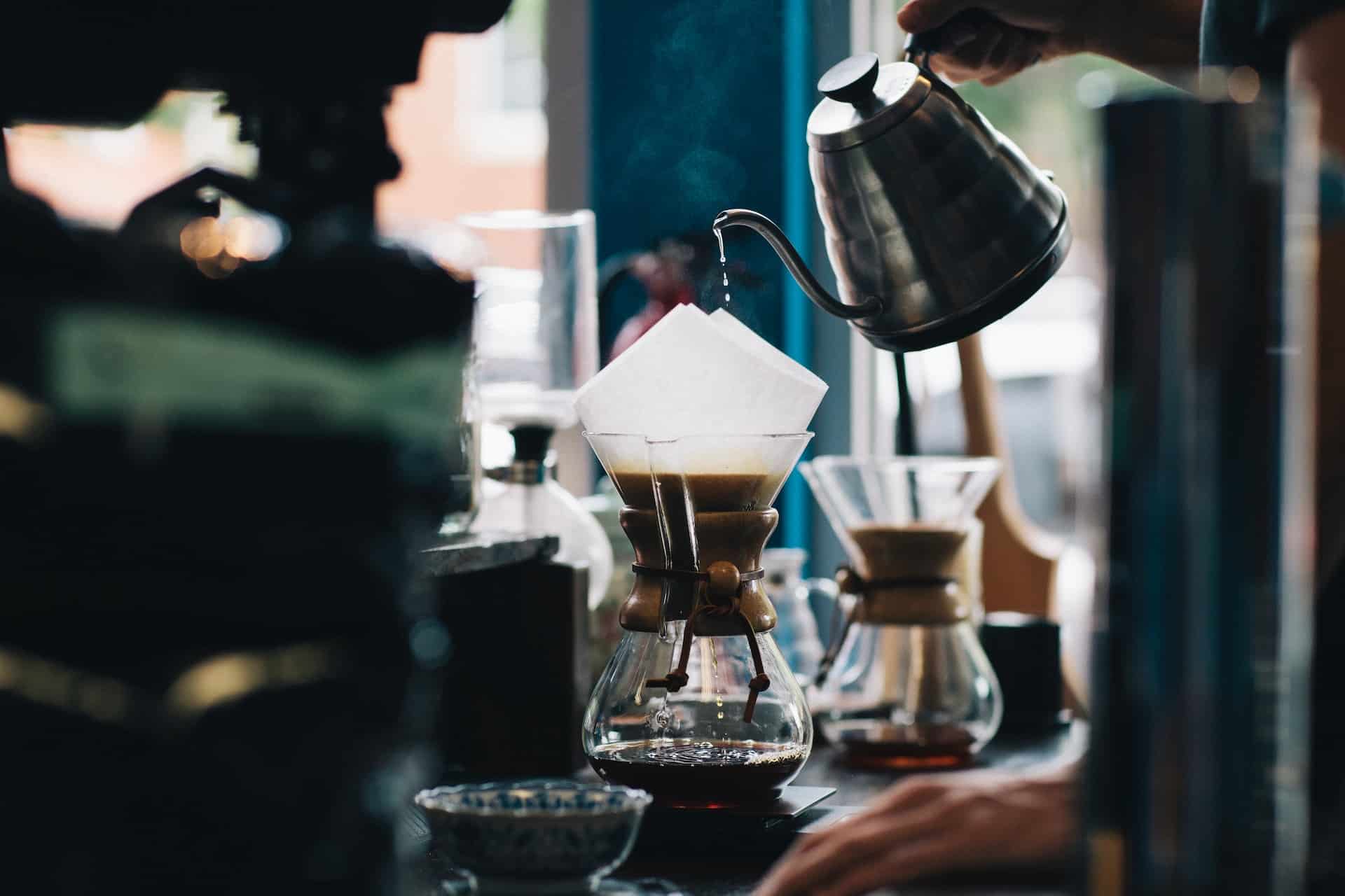 pouring boiling water over coffee