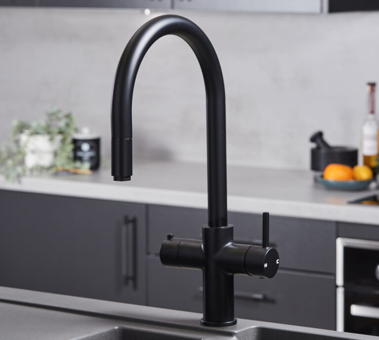 a swan neck pull-out hot water tap in matte black