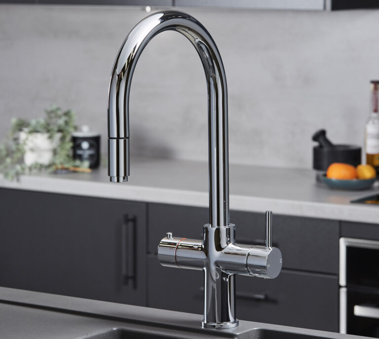 a swan neck pull-out hot water tap in chrome