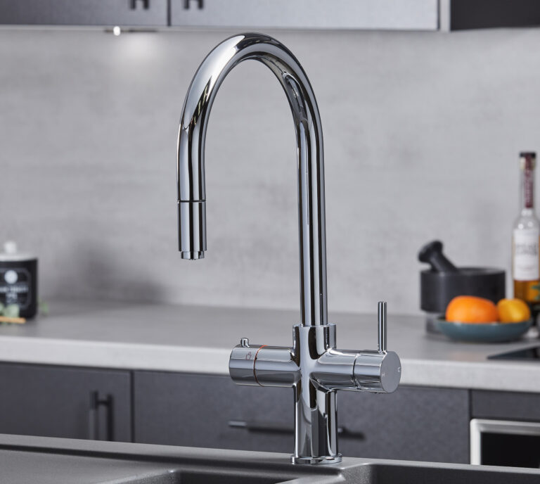 a swan neck pull-out hot water tap in chrome