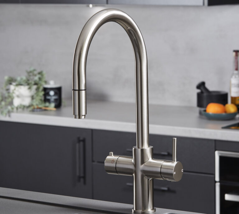 a swan neck pull-out hot water tap in brushed nickel