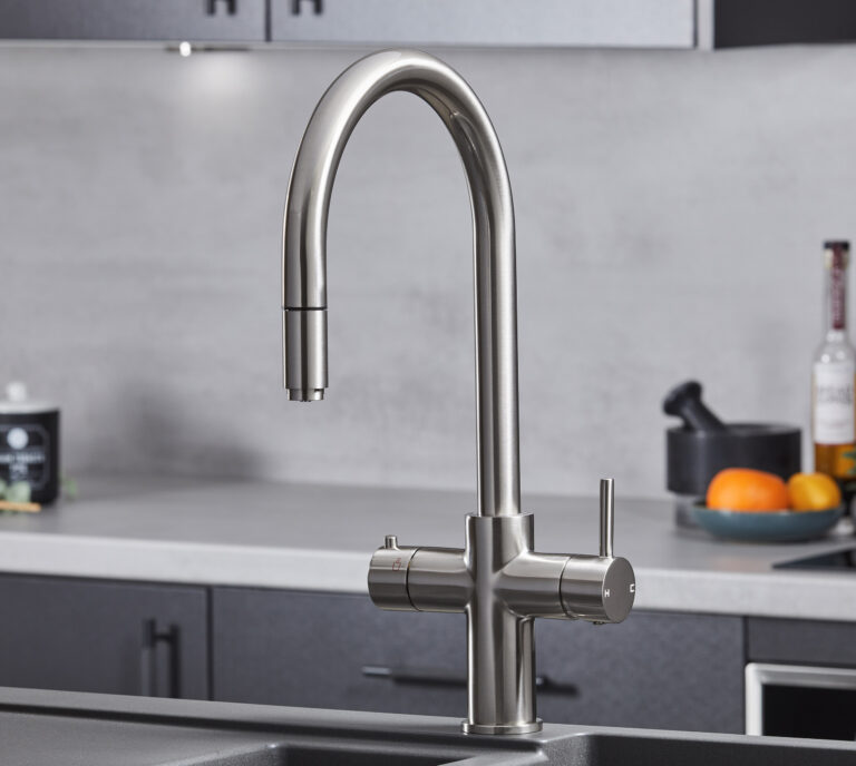 a swan neck pull-out hot water tap in brushed nickel