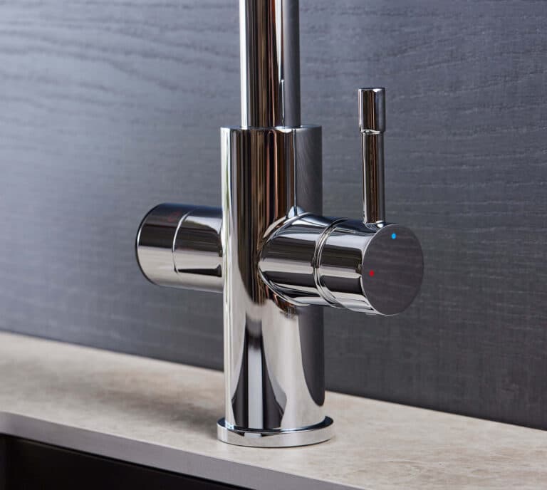 A close up of a 5-in-1 boiling water tap in chrome